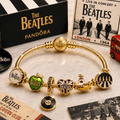 TBE Gold Charm Bracelet Set BMD